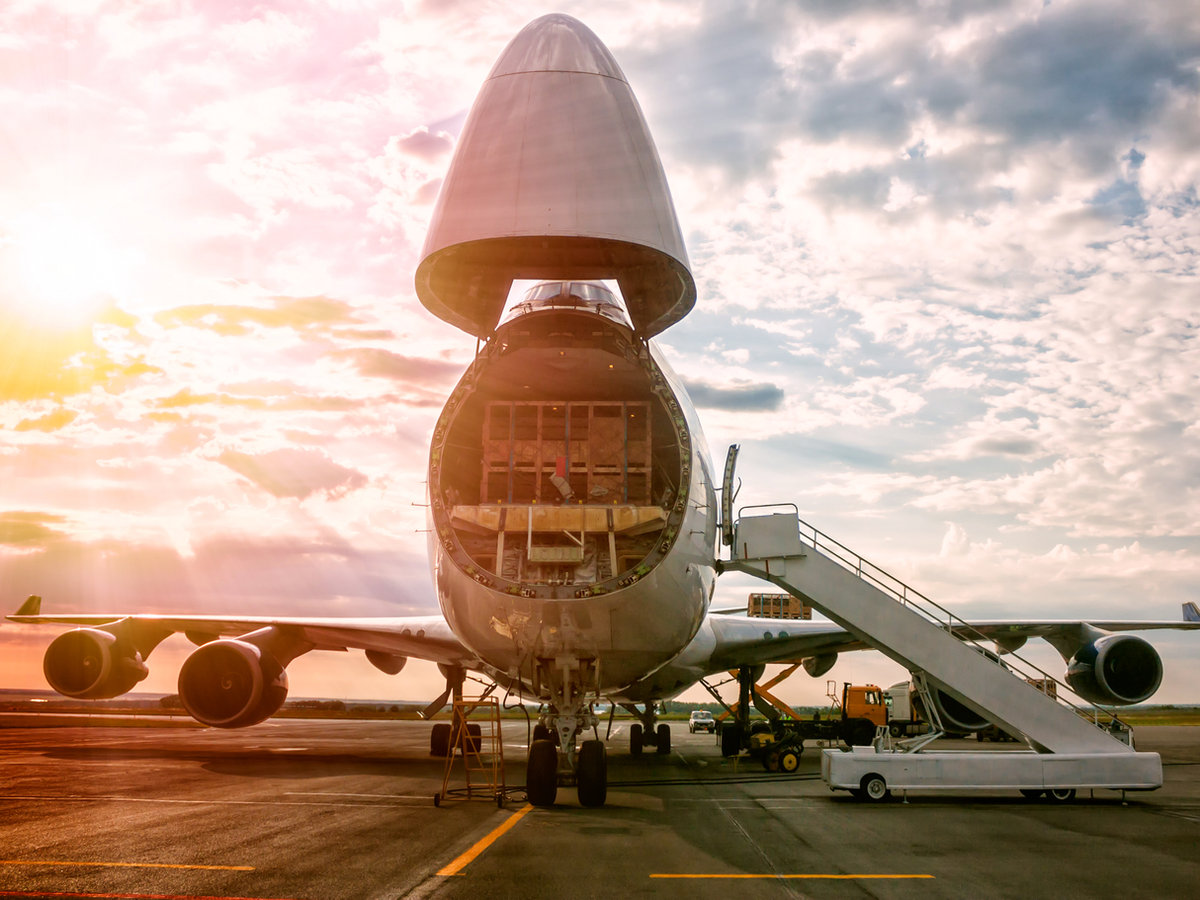 Unloading a wide body cargo aircraft
